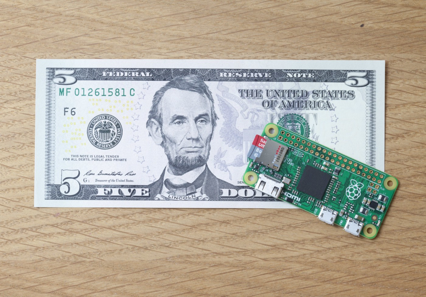 Raspberry Pi Zero compared to a dollar bill